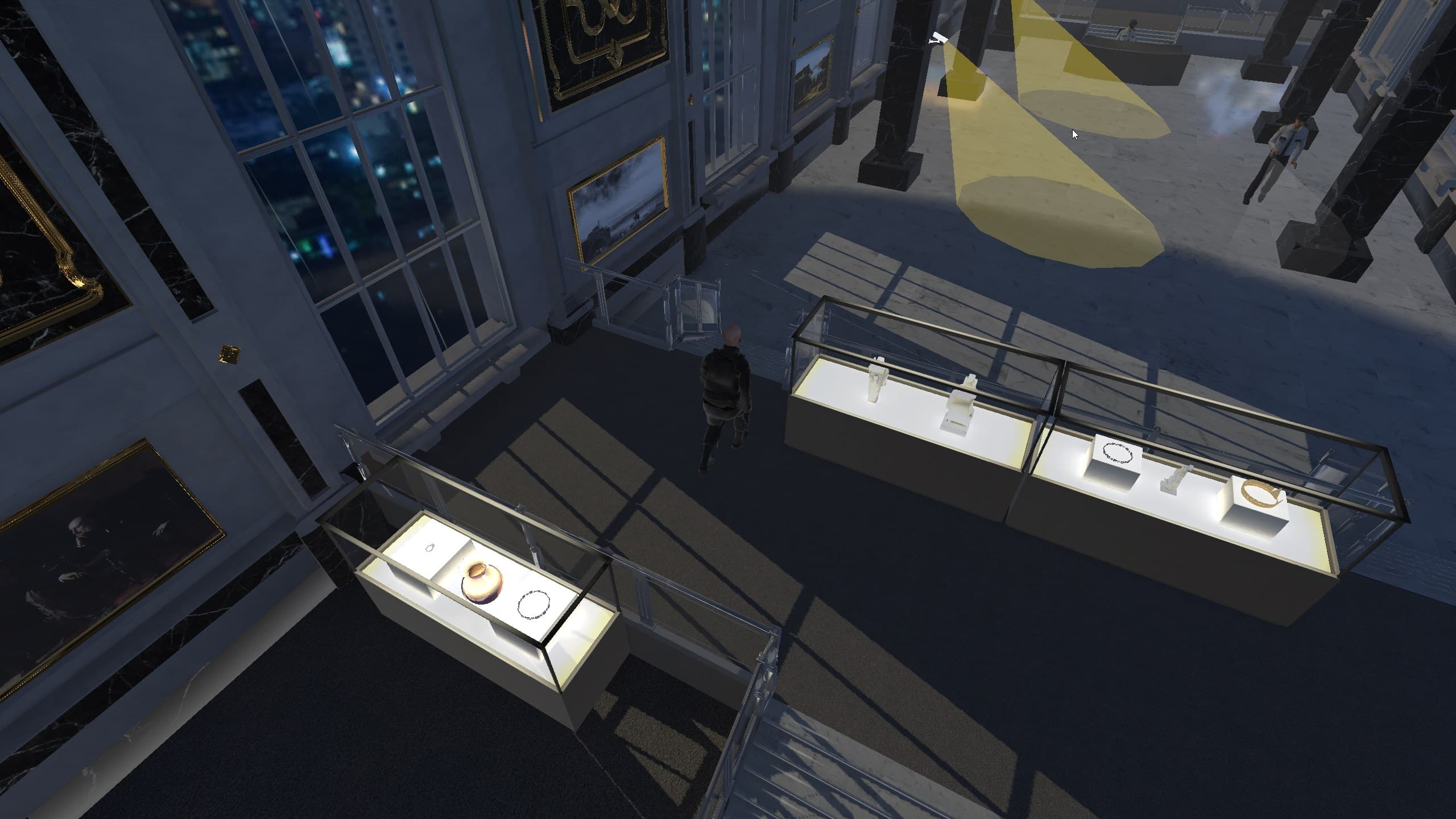 Screenshot from The Great Fleece showing a richly decorated and luxurious museum interior where the game is set. The museum features marble floors and dark marble columns, with large golden chandeliers hanging from the ceiling. The main floor is filled with glass display cases showcasing various valuable items. Multiple security guards patrol the area. The player's character is seen at the starting position of the level hidden behind some cases.
